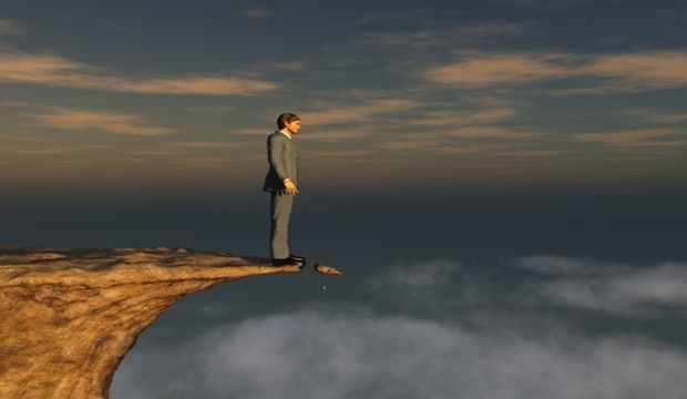 man on cliff