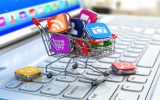 Store of laptop software. Apps icons in shopping cart. 3d