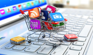 Store of laptop software. Apps icons in shopping cart. 3d