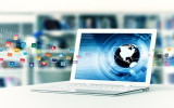 Conceptual image about how a laptop computer with internet open a virtual door to worldwide information sharing.