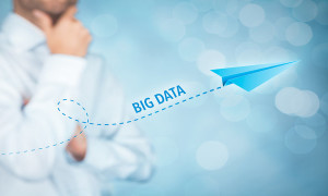 Big data growth (big-data) concept. Businessman think about accelerating data volume (big data) represented by paper plane.