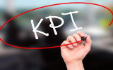 Man Hand writing KPI (Key Performance Indicator) with black marker on visual screen. Isolated on background. Business technology internet concept. Stock Photo