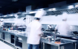 modern hotel kitchen and busy chefs.