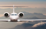 Travel by aircraft. Airplane fly over clouds and Alps mountain on down. Front view of a big passenger or cargo plane, business jet, airline. Transportation concept. Empty space for text.
