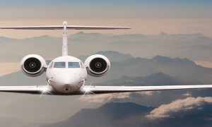 Travel by aircraft. Airplane fly over clouds and Alps mountain on down. Front view of a big passenger or cargo plane, business jet, airline. Transportation concept. Empty space for text.