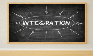 Integration - 3d render illustration of text on black chalkboard in a room.