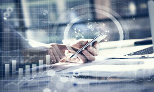 Business concept. Businessman working generic design laptop and smartphone. Worldwide connection technology interface, horizontal