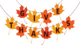 Give Thanks text on autumn leaves - greetings decoration for Thanksgiving Day