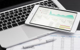 Business analytic with tablet pc and laptop computer