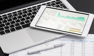 Business analytic with tablet pc and laptop computer