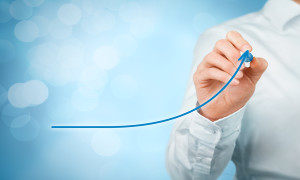 Development growth and improvement concepts. Businessman plan growth and increase of positive indicators in his business like efficiency productivity rating revenue and success.