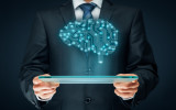 Artificial intelligence (AI), data mining, expert system software, machine learning, deep learning and another modern computer technologies concepts. Brain representing artificial intelligence with printed circuit board (PC
