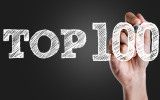 Hand writing the text: Top 100