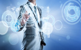 Business man in blue grey suit using digital pen working with digital virtual screen business concept of marketing strategy plan