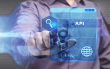 Business Technology Internet and network concept. Young businessman working on a virtual screen of the future and sees the inscription: API