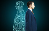 Businessman with digital partner standing back-to-back on dark background