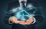 Cloud computing service concept - connect to cloud. Businessman offering cloud computing service represented by icon communication with cloud represented by lines and light points.