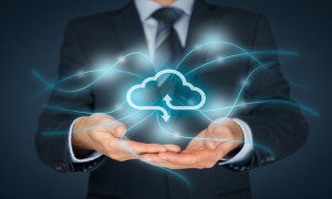 Cloud computing service concept - connect to cloud. Businessman offering cloud computing service represented by icon communication with cloud represented by lines and light points.