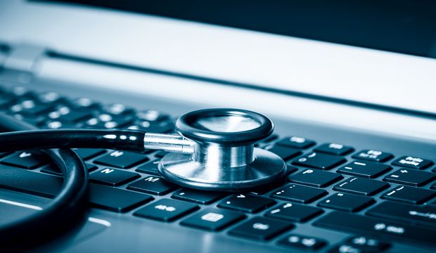 Computer or data analysis - Stethoscope over a laptop computer k