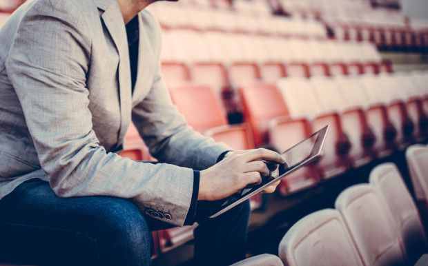 Footbal manager on the stands