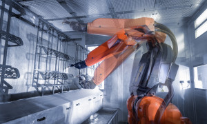 Multiple exposure of robot spray painting automotive parts in spray paint factory, close up