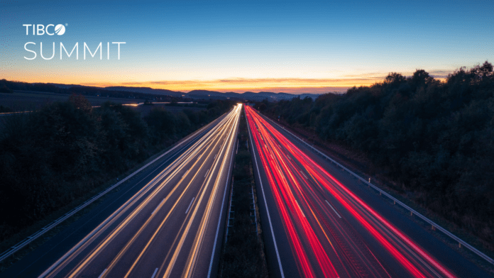 A long exposure image of a highway at dusk, with white headlights on the left and red taillights on the right, under a clear sky with the TIBCO Summit logo in the top left corner.